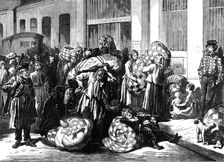 The Distress in Paris, distribution of bedding to the poor, 1874. Creator: Jenkin