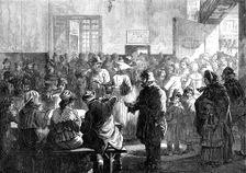 The Distress in Paris: giving soup to the poor at the charity kitchen, rue de Sevres, 1874. Creator: Jenkin