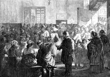 The Distress in Paris: giving soup to the poor at the charity kitchen, rue de Sevres, 1874. Creator: Jenkin