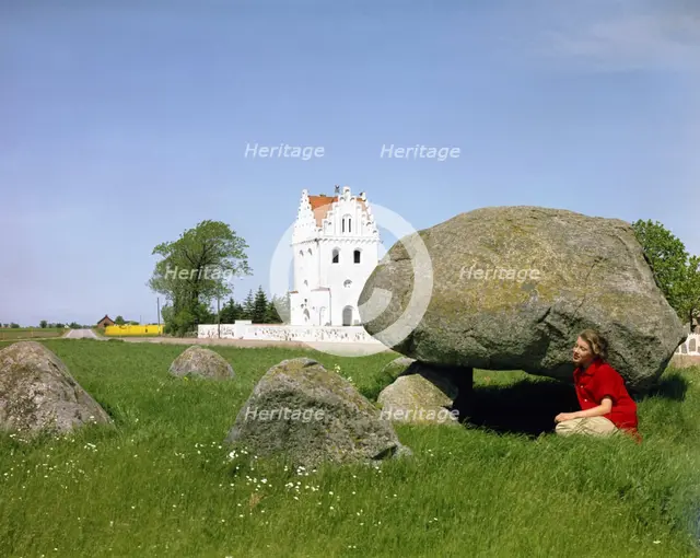The dolmen and the Church of Skegrie, Scania, Sweden. Creator: Göran Algård.
