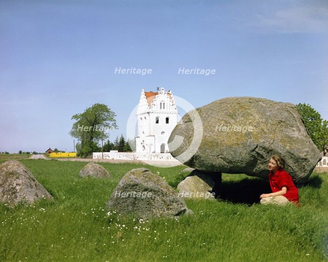 The dolmen and the Church of Skegrie, Scania, Sweden. Creator: Göran Algård.