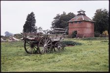 The dovecote to the south-west of Kentwell Hall seen with an old wooden wagon..., Long Melford, 1980 Creator: Dorothy Chapman