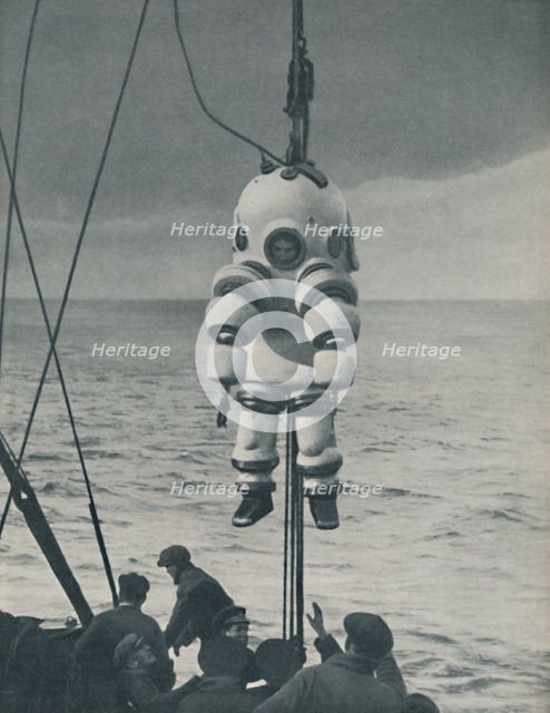 'The Eternal Fight Against the Sea: Armoured Casing for the Deep-Sea Diver', c1935. Artist: Pacific and Atlantic.