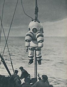 The Eternal Fight Against the Sea: Armoured Casing for the Deep-Sea Diver c1935. Artist: Pacific and Atlantic