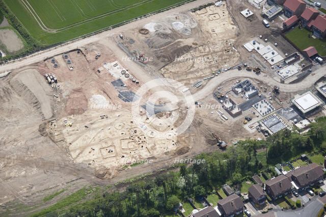 The excavation of an extensive barrow cemetery, Pocklington, East Riding of Yorkshire, 2015. Creator: Historic England.