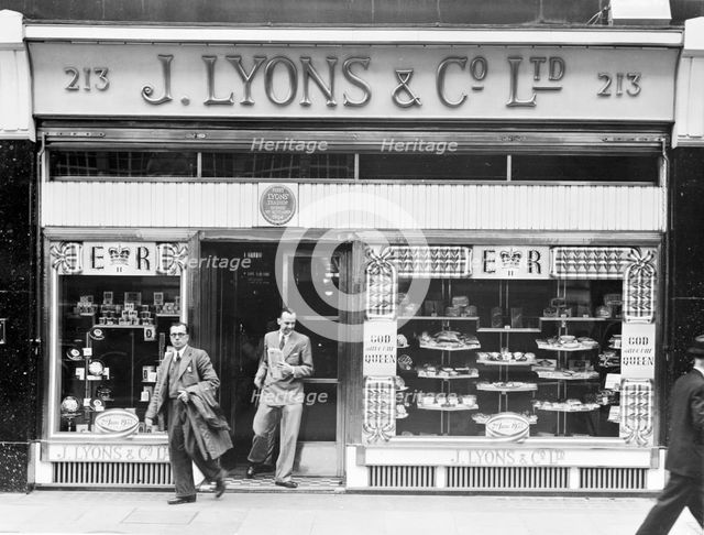 The exterior of a Lyons tea shop along Piccadilly, London, 2nd July 1953. Artist: Unknown