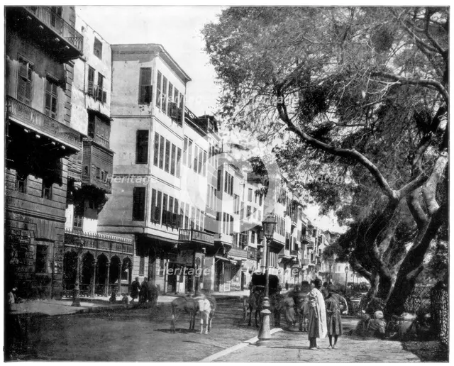 'The Ezbekiyeh and Street Scene, Cairo, Egypt', late 19th century. Artist: John L Stoddard