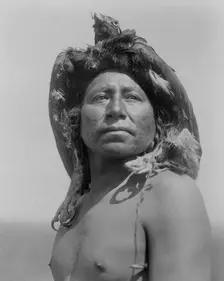 The Eagle Medicine-Man-Apsaroke, c1908. Creator: Edward Sheriff Curtis