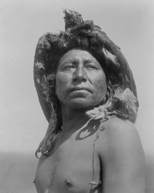The Eagle Medicine-Man-Apsaroke, c1908. Creator: Edward Sheriff Curtis