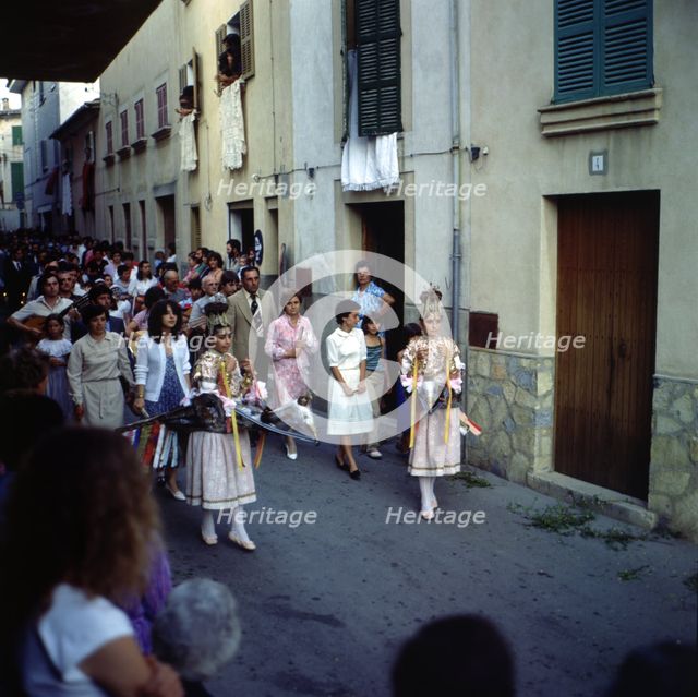 The Eagles', popular characters that dance preceding the procession of Corpus Christi day, held i…