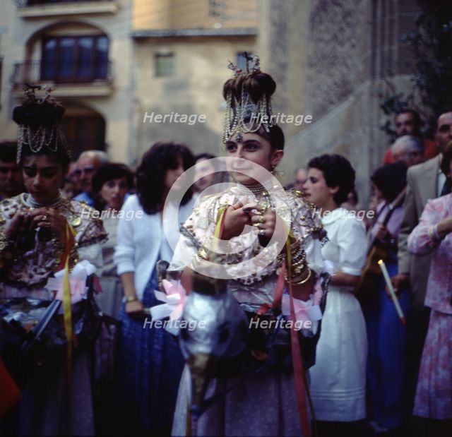 The Eagles', popular characters that dance preceding the procession of Corpus Christi day, held i…
