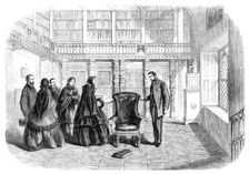 The Empress Eugenie in Sir Walter Scott's study at Abbotsford, 1860. Creator: Unknown