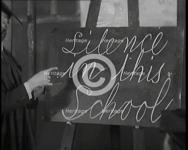 The Entertainer Will Hay Writing on a Blackboard, 1920s Creator: British Pathe Ltd.