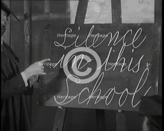 The Entertainer Will Hay Writing on a Blackboard, 1920s Creator: British Pathe Ltd.