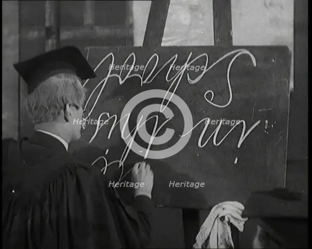 The Entertainer Will Hay...Writing upside down on a Blackboard,1920s Creator: British Pathe Ltd.
