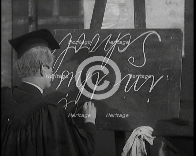 The Entertainer Will Hay...Writing upside down on a Blackboard,1920s Creator: British Pathe Ltd.