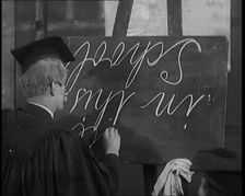 The Entertainer Will Hay...Writing upside down on a Blackboard,1920s Creator: British Pathe Ltd