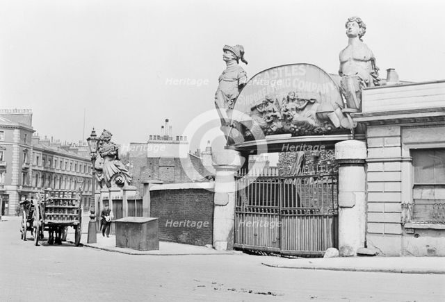 The entrance to Castles' Shipbreaking Company, Millbank, London. Creator: Unknown.