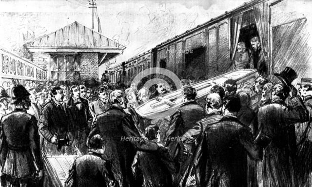 The Funeral of Mr. Gladstone: placing the body in the train at Broughton Hall Station, 1898. Creator: Unknown.