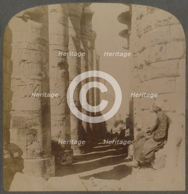 'The famous colonnade of the great Hypostyle Hall in the Temple of Karnak, Thebes, Egypt', 1897. Creator: Underwood & Underwood.
