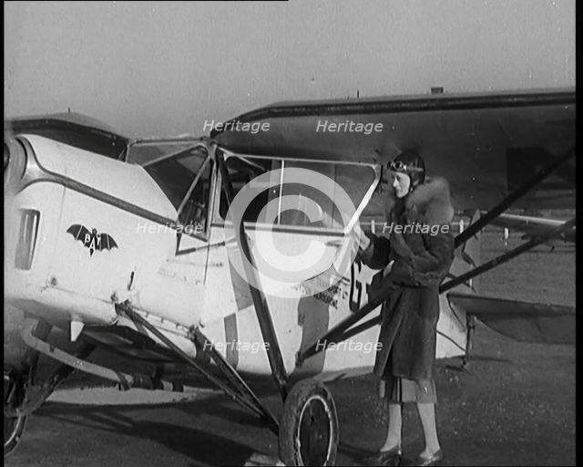 The Female Actor Ursula Jeans Climbing Into Her De Havilland Moth and Taking Off, 1929. Creator: British Pathe Ltd.