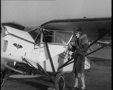 The Female Actor Ursula Jeans Climbing Into Her De Havilland Moth and Taking Off, 1929. Creator: British Pathe Ltd