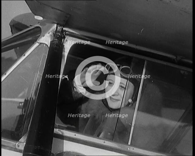 The Female Actor Ursula Jeans Climbing Into Her De Havilland Moth and Taking Off, 1929. Creator: British Pathe Ltd.