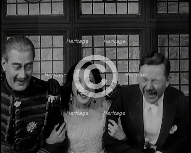 The Female Actor Josie Collins Performing in  a Play With Two Male Actors, 1920s. Creator: British Pathe Ltd.