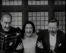 The Female Actor Josie Collins Performing in a Play With Two Male Actors, 1920s. Creator: British Pathe Ltd
