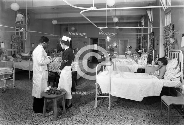 The female medical ward at the Montague Hospital, Mexborough, South Yorkshire, 1959.  Creator: Michael Walters.