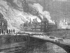 The Fighting in Paris: burning of the Hotel de Ville, 1871. Creator: Unknown