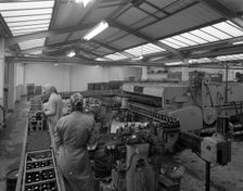The final process of bottling beer, Ward & Sons bottling plant, Swinton, South Yorkshire, 1960. Creator: Michael Walters