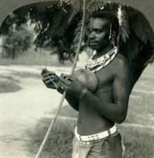The Finery of a Native Hunter in the Belgian Congo, Africa c1930s. Creator: Unknown