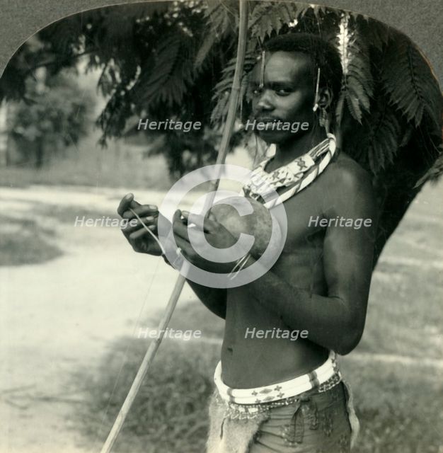 'The Finery of a Native Hunter in the Belgian Congo, Africa', c1930s. Creator: Unknown.