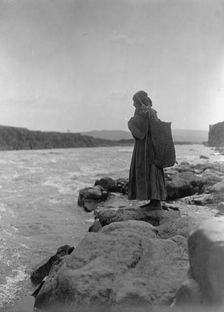 The fish carrier-Wisham (i.e. Wishram), c1910. Creator: Edward Sheriff Curtis