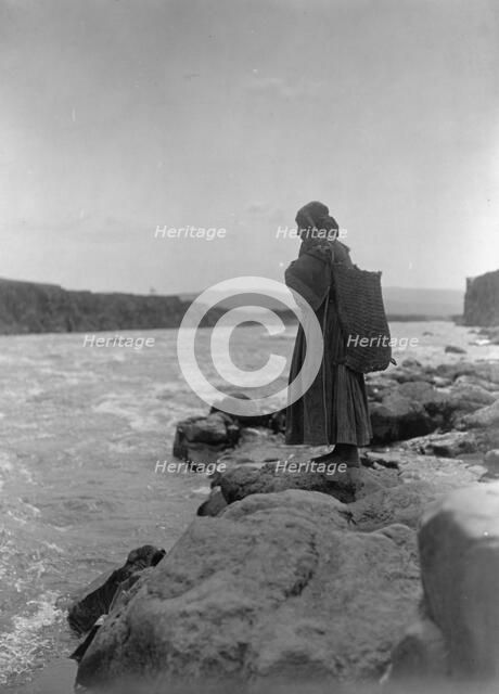 The fish carrier-Wisham (i.e. Wishram), c1910. Creator: Edward Sheriff Curtis.