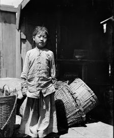 The fish dealer's daughter, Chinatown, San Francisco, between 1896 and 1906. Creator: Arnold Genthe