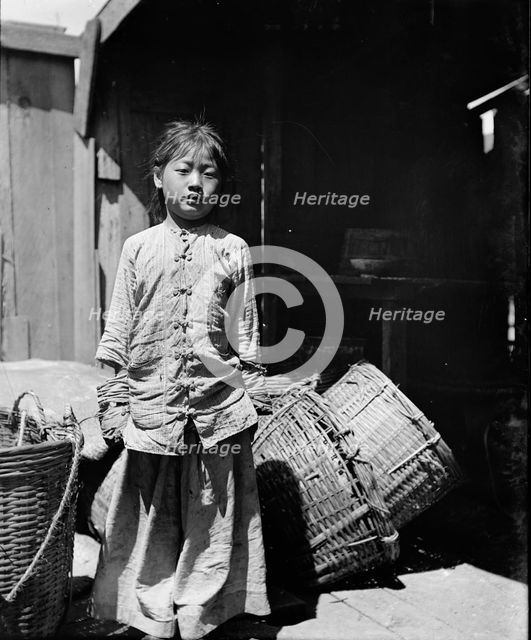 The fish dealer's daughter, Chinatown, San Francisco, between 1896 and 1906. Creator: Arnold Genthe.