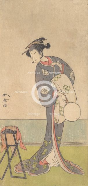 The First Nakamura Tomijuro as an Oiran Standing in a Room, 1771. Creator: Shunsho.