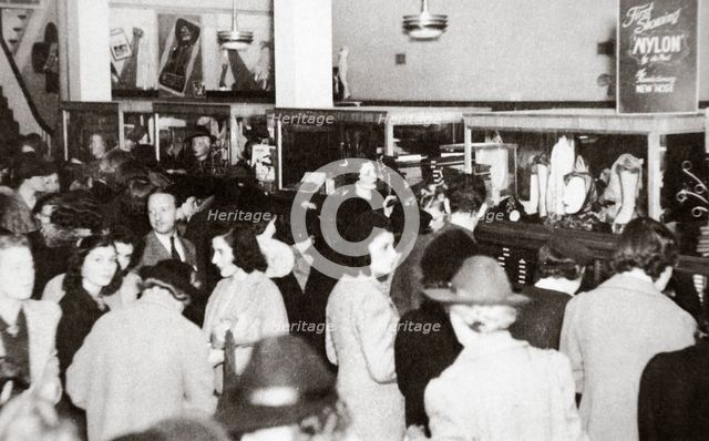 The first experimental sale of nylon stockings, Wilmington, Delaware, USA, 25 October, 1939. Creator: Unknown.