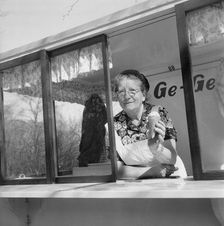 The first ice cream of the year; woman in her ice cream stall, Landskrona, Sweden, 1953