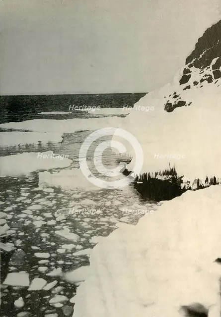'The First Landing-Place, Showing Bay Ice Breaking Out and Drifting Away North', 1908, (1909). Artist: Unknown.