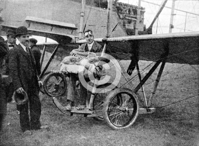 The first parachute drop from an aeroplane in England, 1914 (1934). Artist: Flight Photo.
