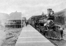 The first regular trans-continental train at Fernie, British Columbia, Canada, 1886 (1951)