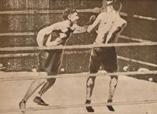 The first wireless photographs from America o England were sent on September 25th. - Dempsey v. Tunn