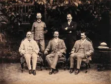 The five members of the Bombay Plague Committee, three sitting, two standing, 1897. Creator: Captain C Moss