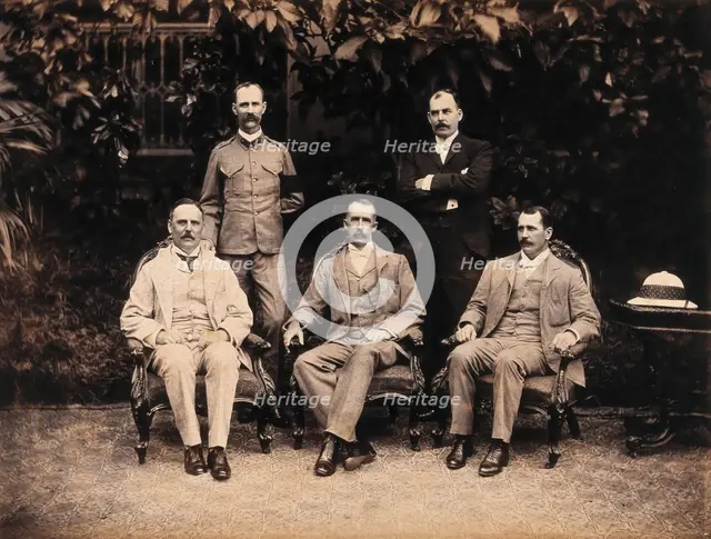 The five members of the Bombay Plague Committee, three sitting, two standing, 1897. Creator: Captain C  Moss.