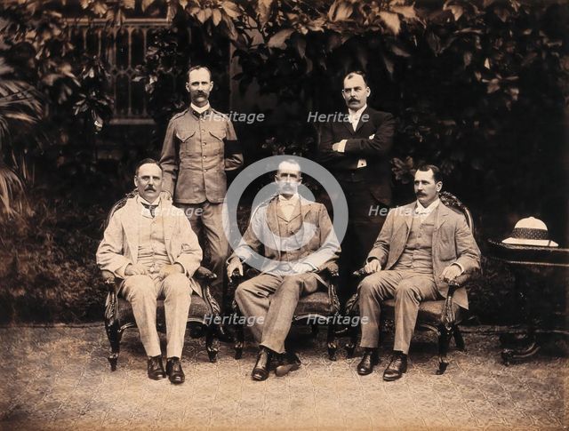 The five members of the Bombay Plague Committee, three sitting, two standing, 1897. Creator: Captain C  Moss.