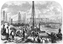 The Flood in the Fens: making the cofferdam, 1862. Creator: Unknown