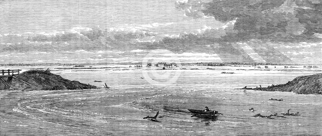 The Flood in the Fens: the breach in the bank, three miles and a half above the sluice, 1862. Creator: Unknown.